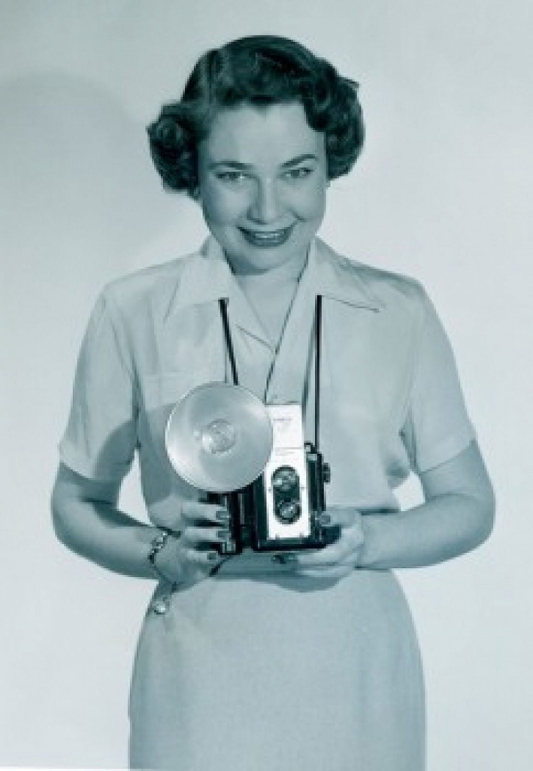 Studio portrait of woman holding video camera Canvas Art - (18 x 24)