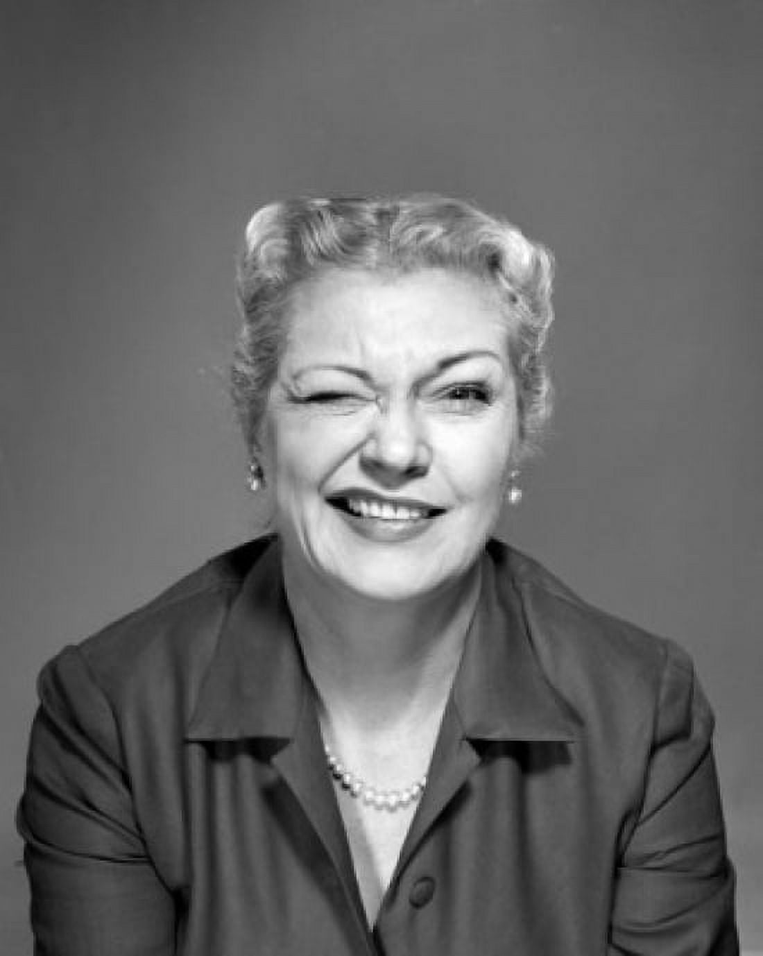 Studio portrait of woman winking Canvas Art - (24 x 36)