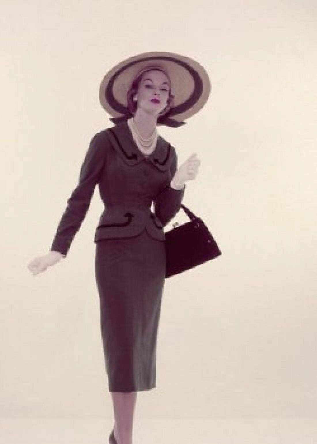 Studio portrait of young elegant woman carrying purse Canvas Art - (18 x 24)