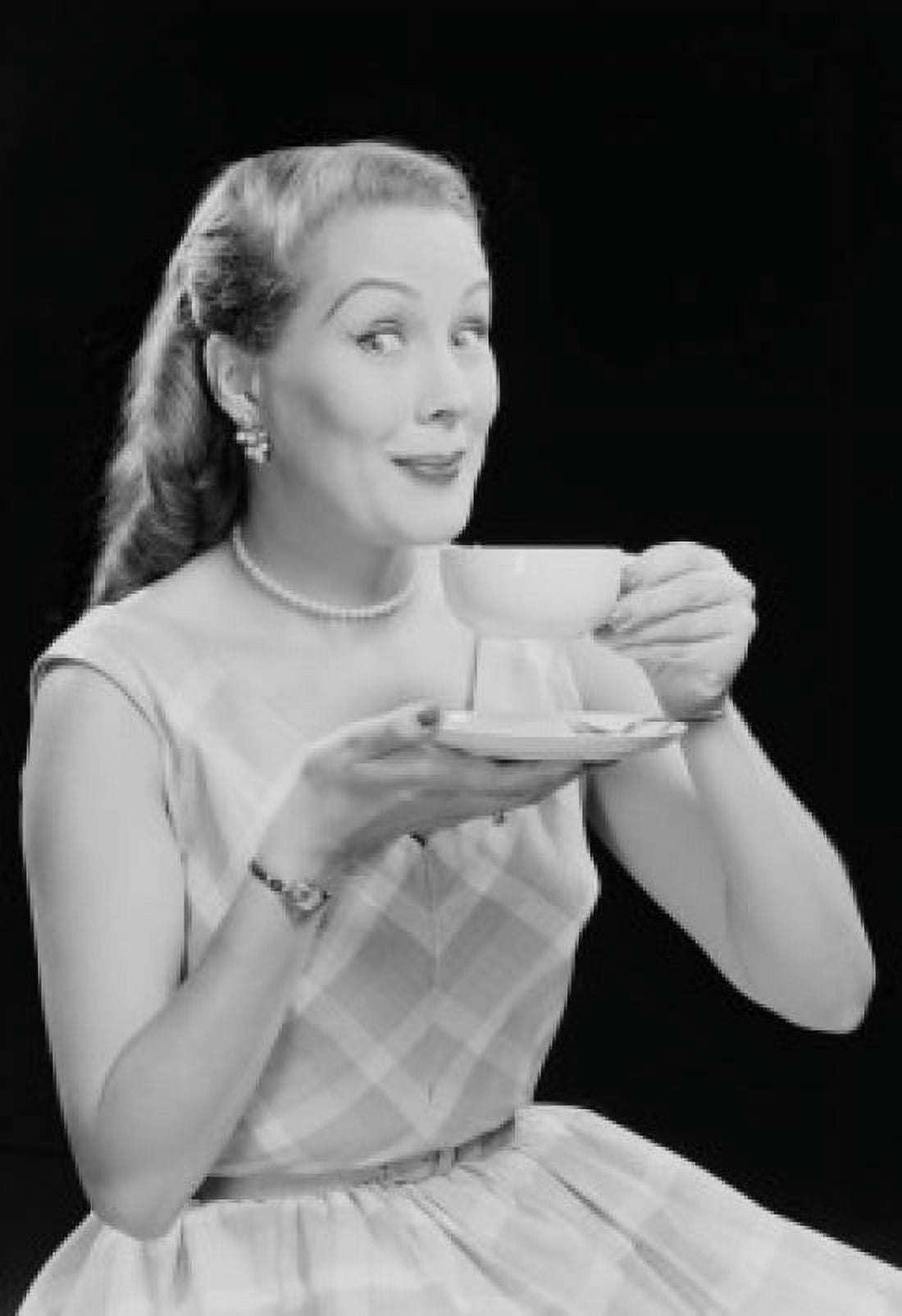 Studio portrait of young woman drinking tea Canvas Art - (18 x 24)
