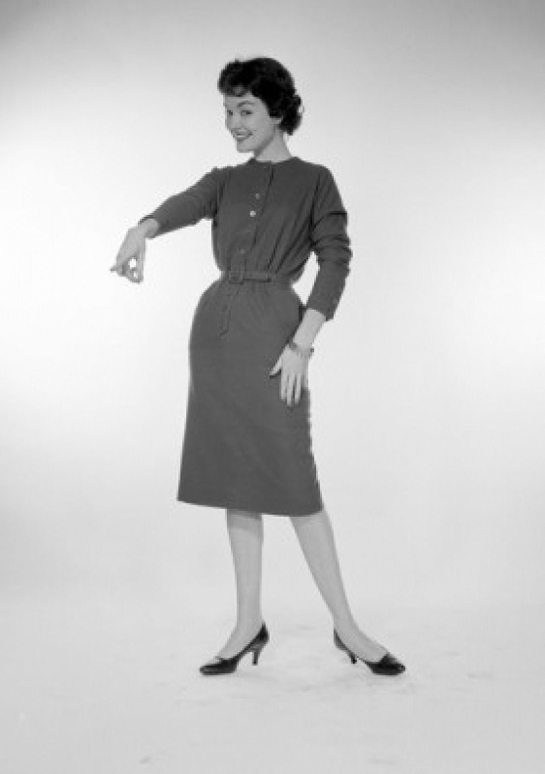 Studio portrait of young woman pointing Canvas Art - (18 x 24)