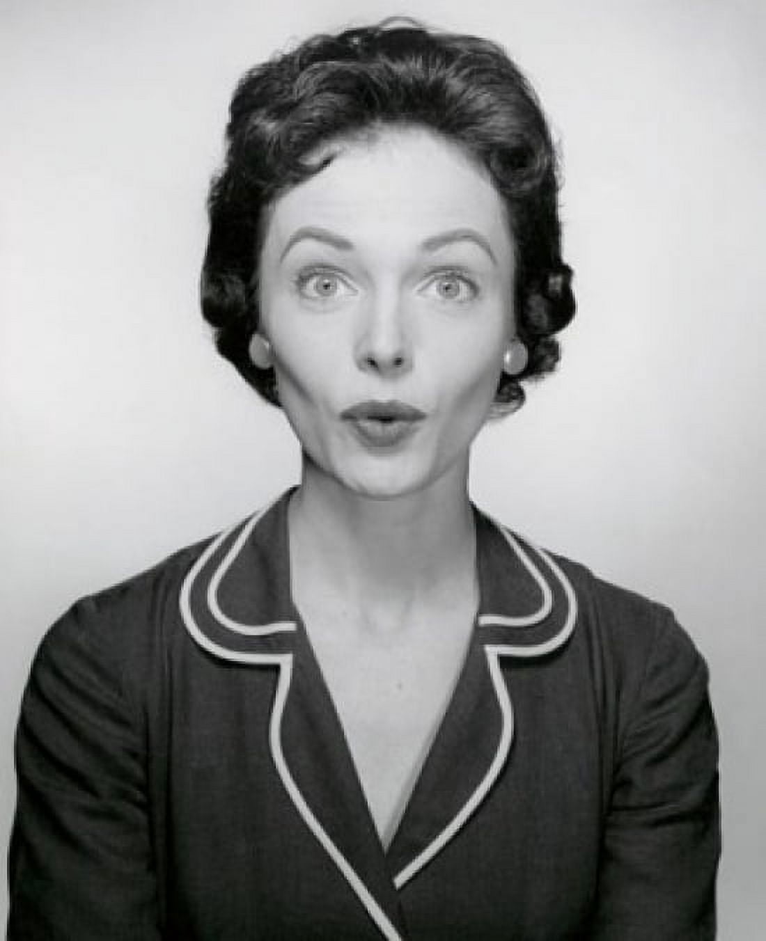 Studio portrait of young woman puckering Canvas Art - (18 x 24)