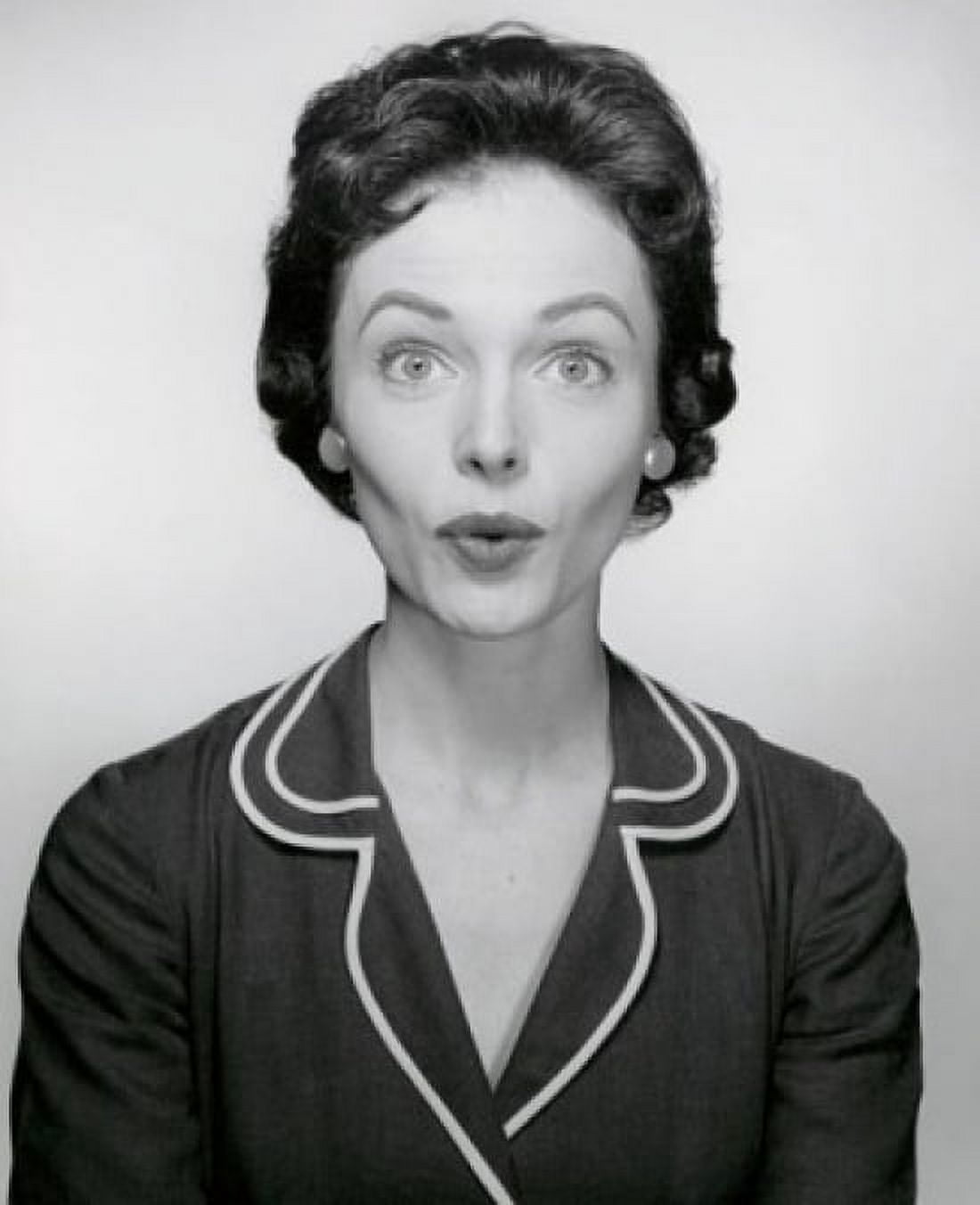 Studio portrait of young woman puckering Canvas Art - (24 x 36)