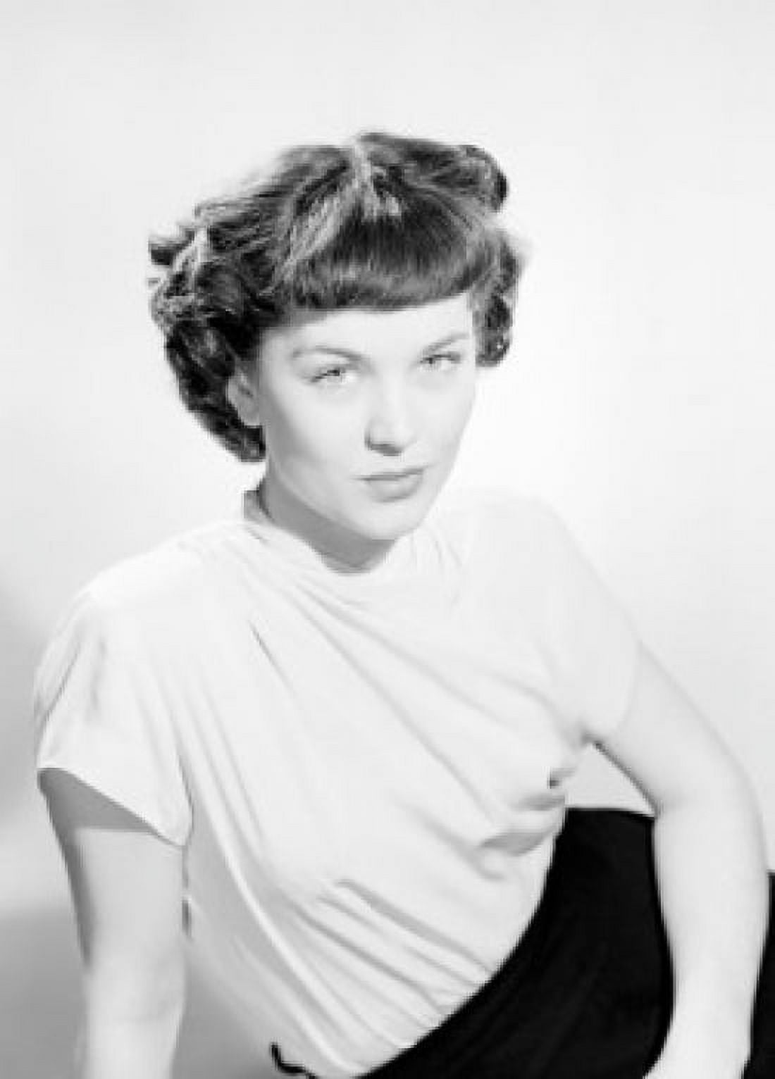Studio portrait of young woman sitting Canvas Art - (24 x 36)
