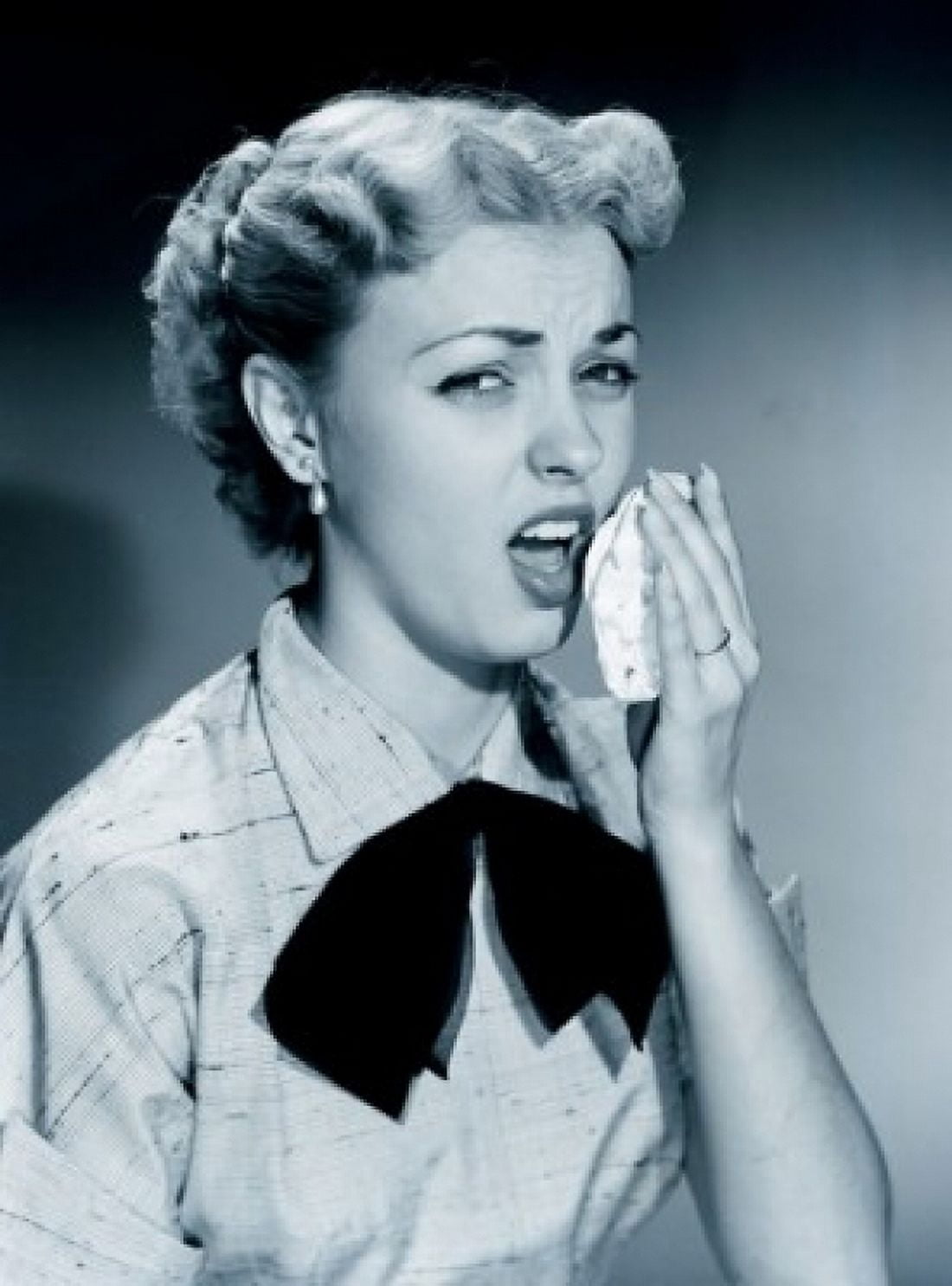 Studio portrait of young woman sneezing Canvas Art - (18 x 24)