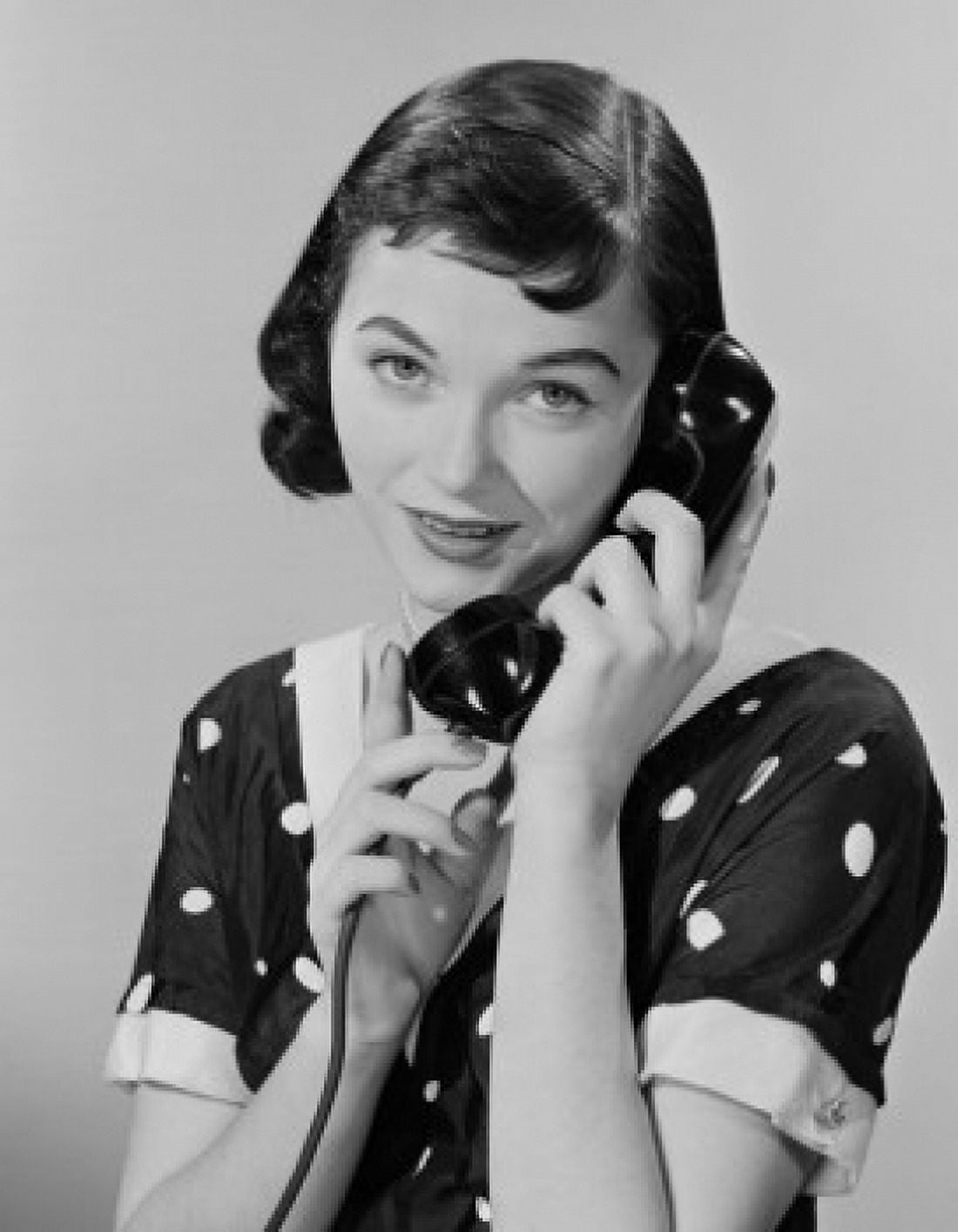 Studio portrait of young woman talking on phone Canvas Art - (24 x 36)