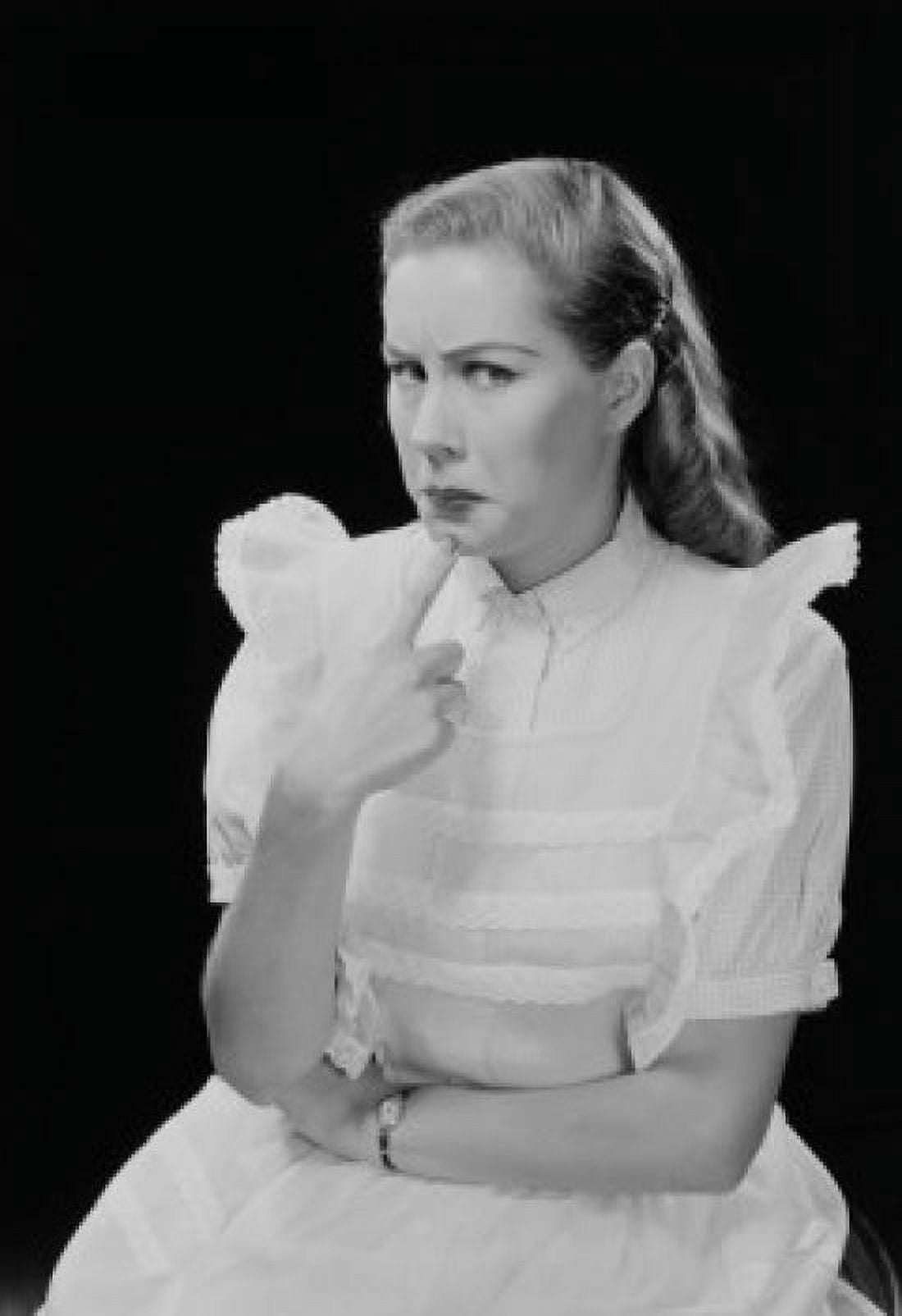 Studio portrait of young woman thinking Canvas Art - (24 x 36)
