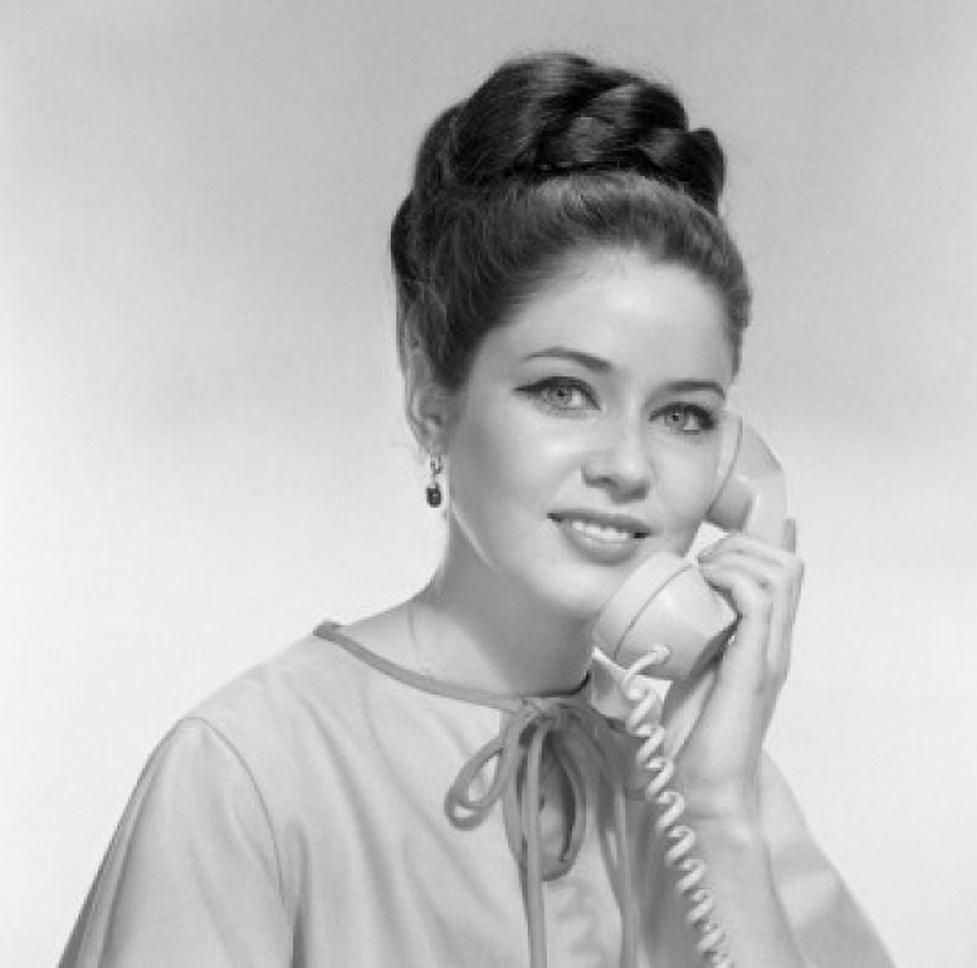Studio portrait of young woman using telephone Canvas Art - (18 x 24)