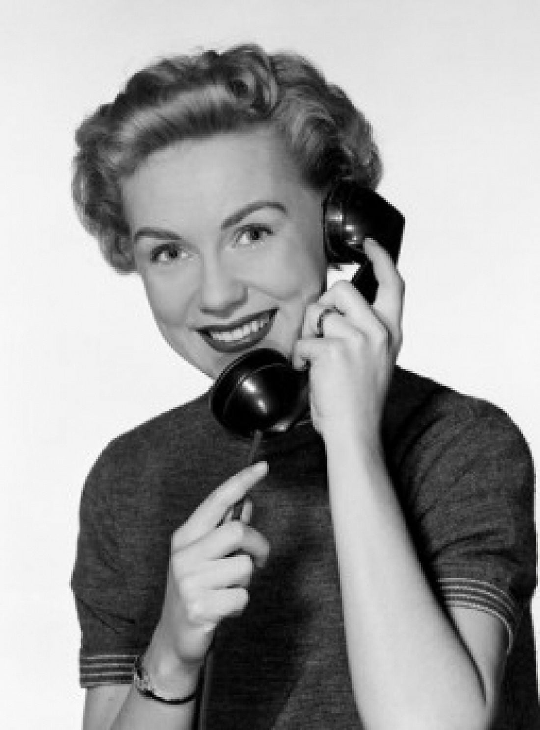 Studio portrait of young woman using telephone Canvas Art - (18 x 24)