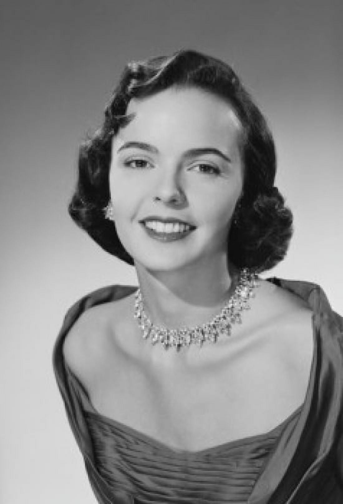Studio portrait of young woman wearing necklace smiling Canvas Art - (18 x 24)