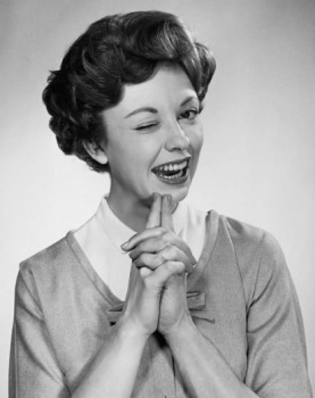 Studio portrait of young woman winking Canvas Art - (24 x 36)