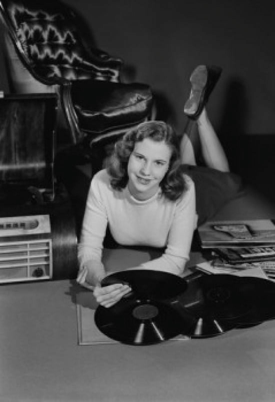 Studio portrait of young woman with records Canvas Art - (18 x 24)