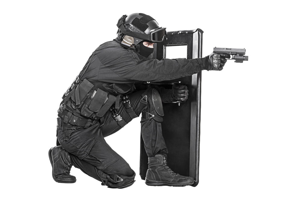 https://i5.walmartimages.com/seo/Studio-shot-of-SWAT-police-special-forces-with-pistol-hiding-behind-ballistic-shield-Poster-Print-by-Oleg-Zabielin-Stocktrek-Images-17-x-11_6755cb6c-6294-4f68-a034-22d75ed85f63.4c699c059fe1f25ed062452252d27e3c.jpeg