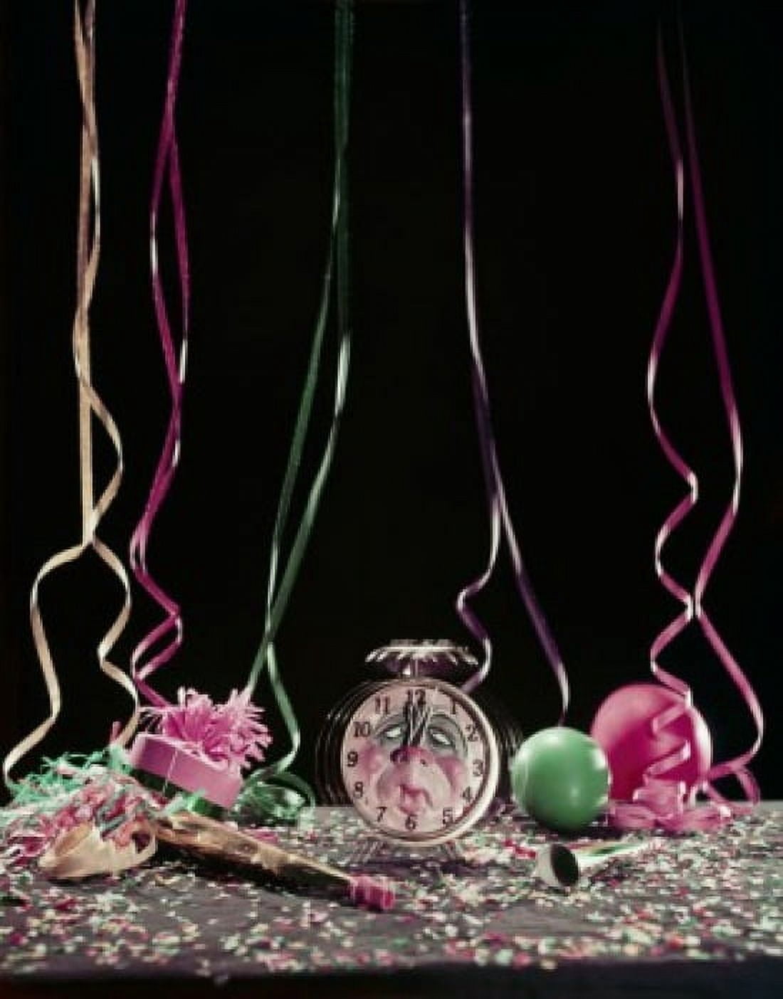 Studio shot of alarm clock with party horn blowers and confetti Canvas Art - (18 x 24)