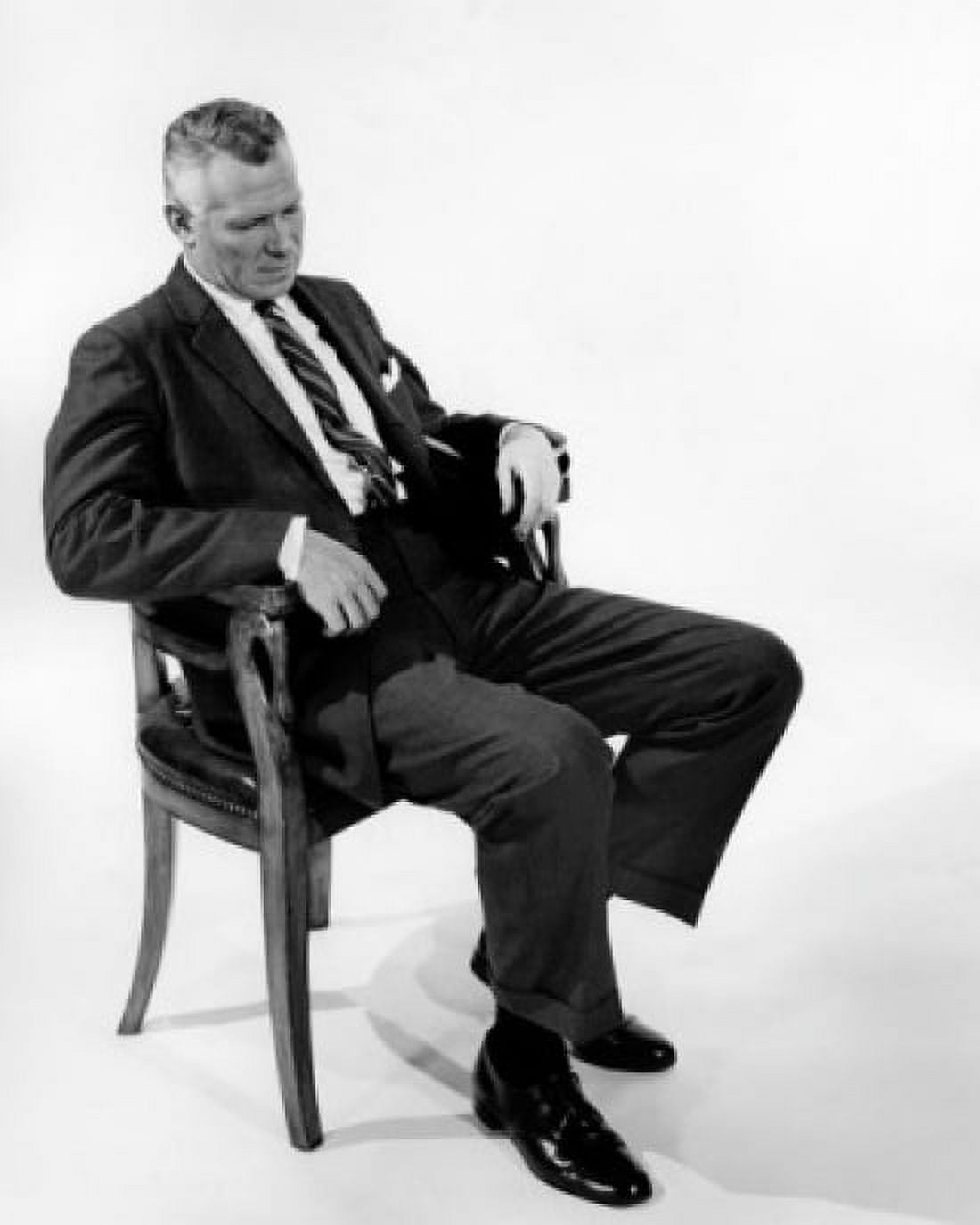 Studio shot of businessman sitting on chair Canvas Art - (24 x 36)