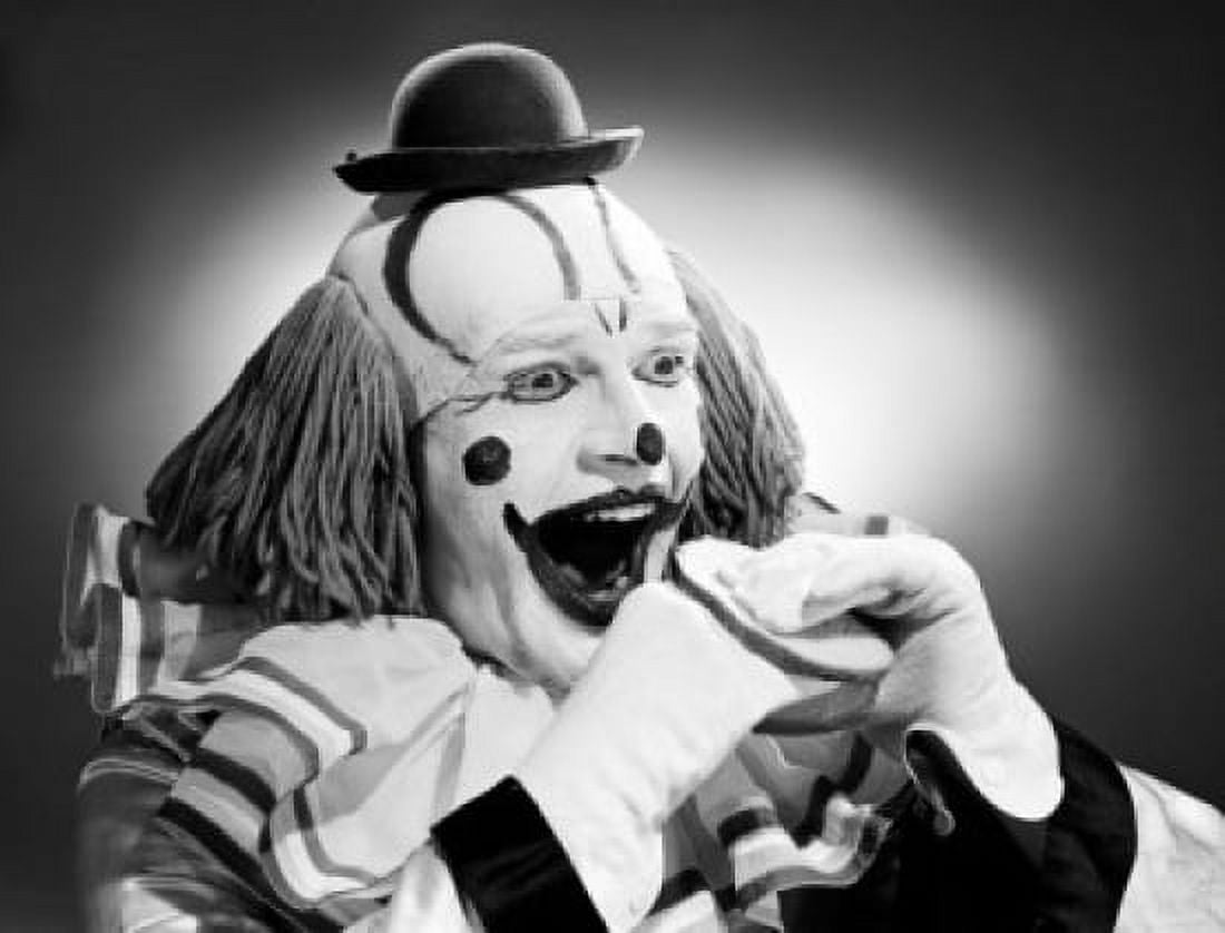 Studio shot of clown eating sandwich Canvas Art - (24 x 36)
