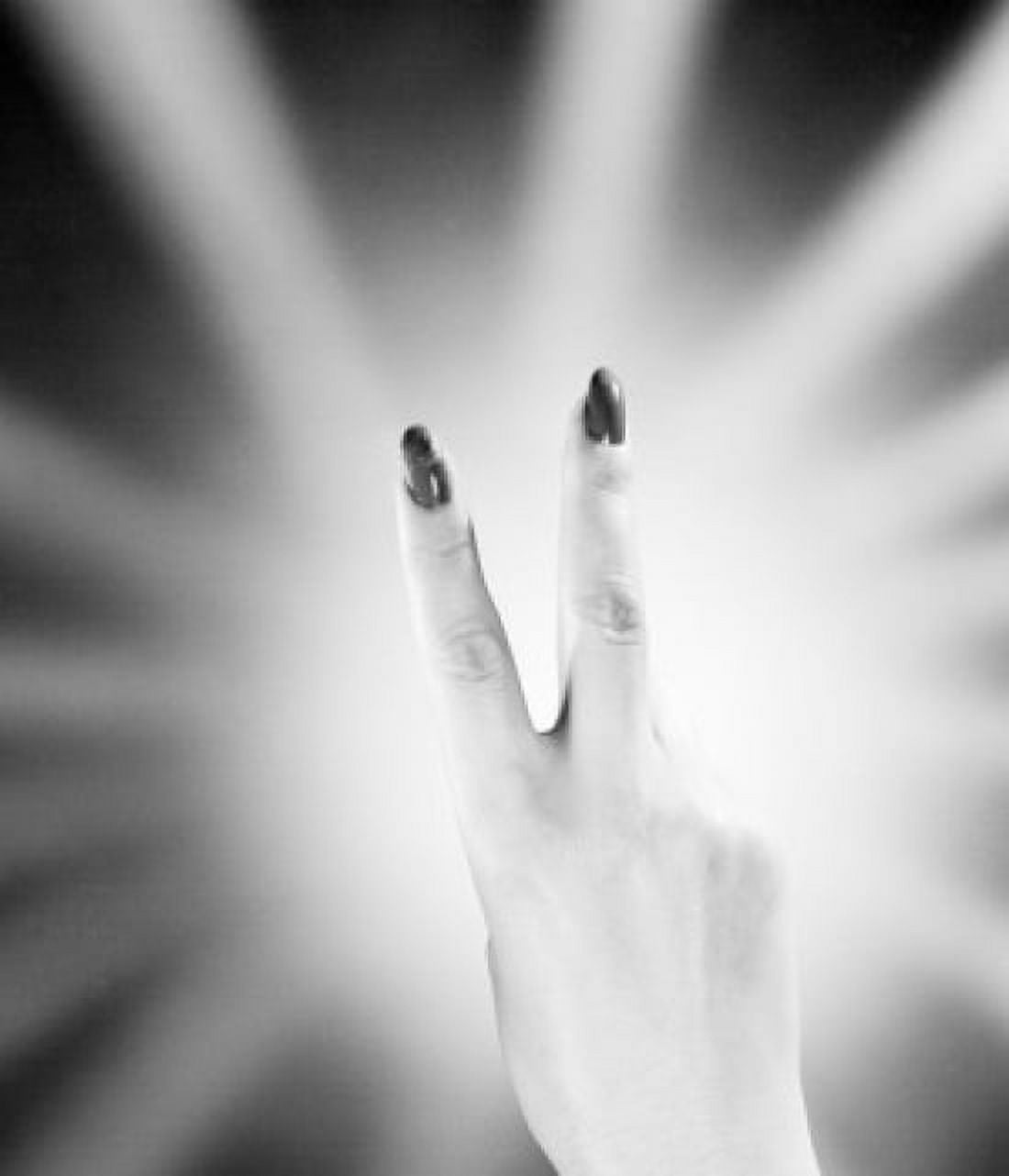 Studio shot of female hand showing peace sign Canvas Art - (18 x 24)