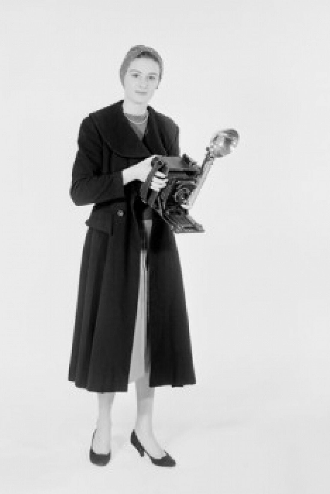 Studio shot of female photographer with camera Canvas Art - (18 x 24)