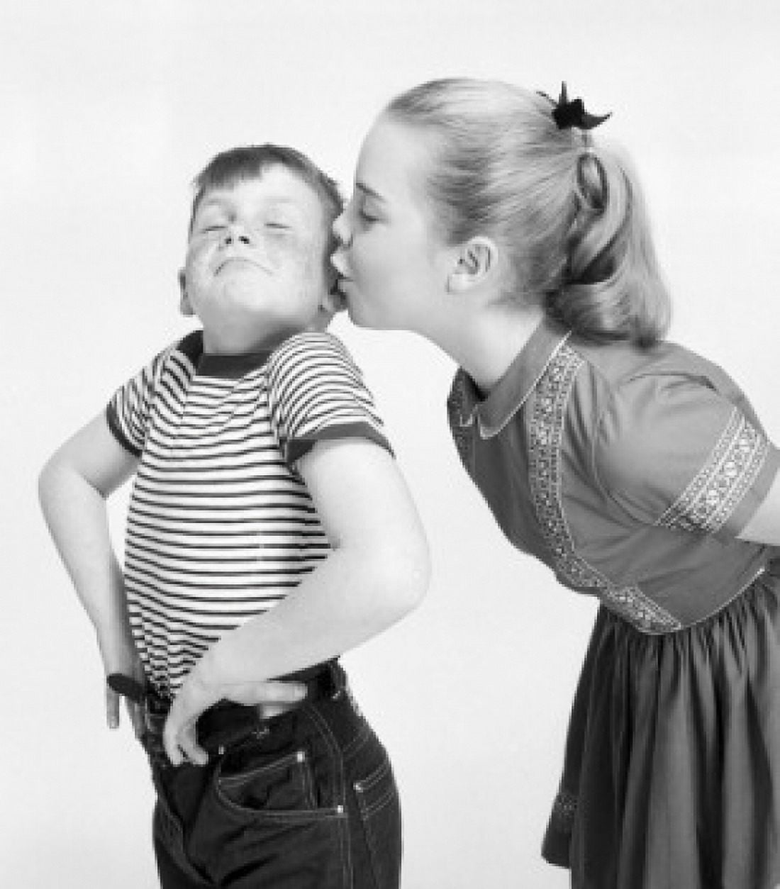Studio shot of girl kissing boy Canvas Art - (18 x 24)