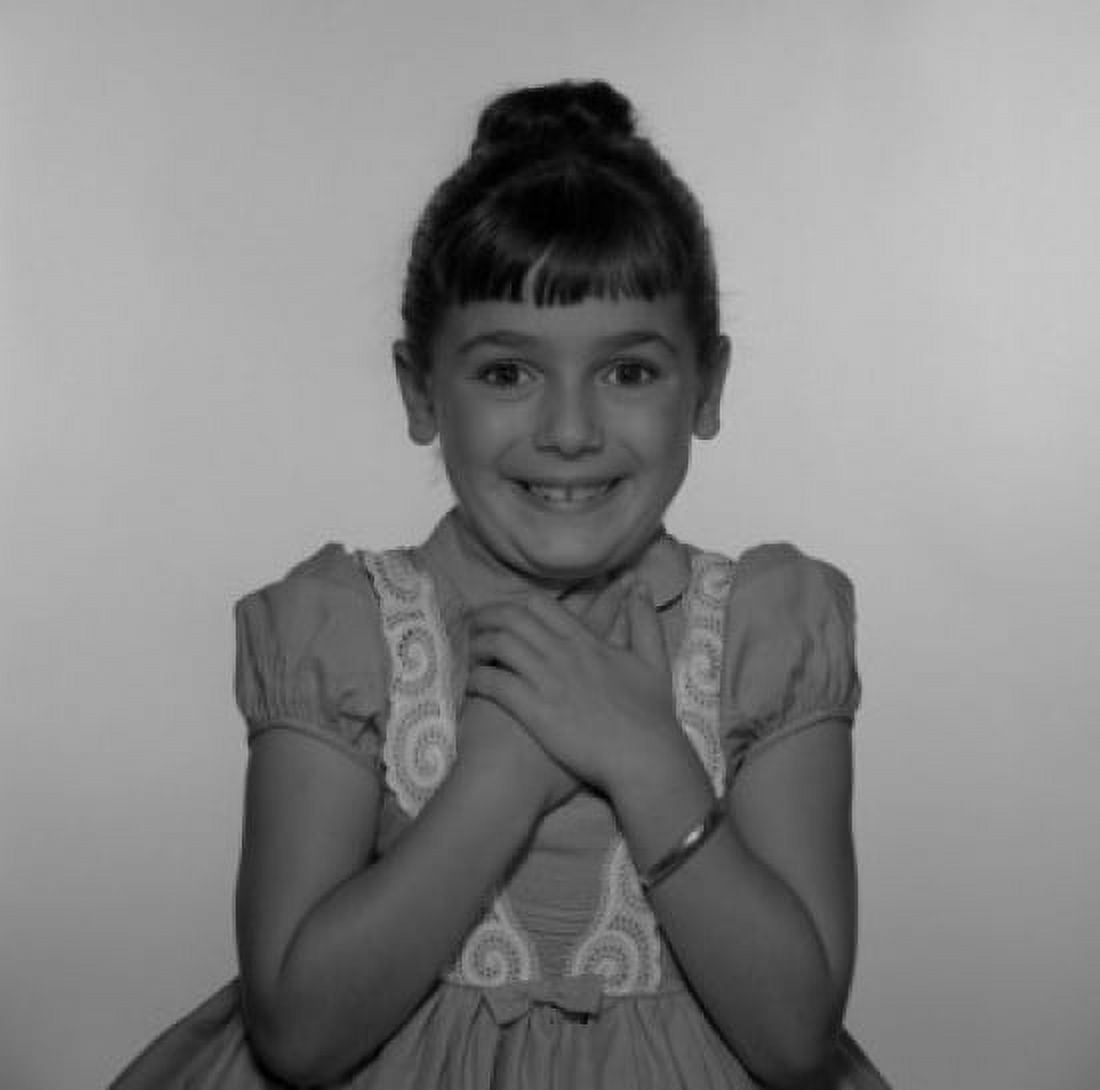 Studio shot of girl with hands on chest Canvas Art - (24 x 36)
