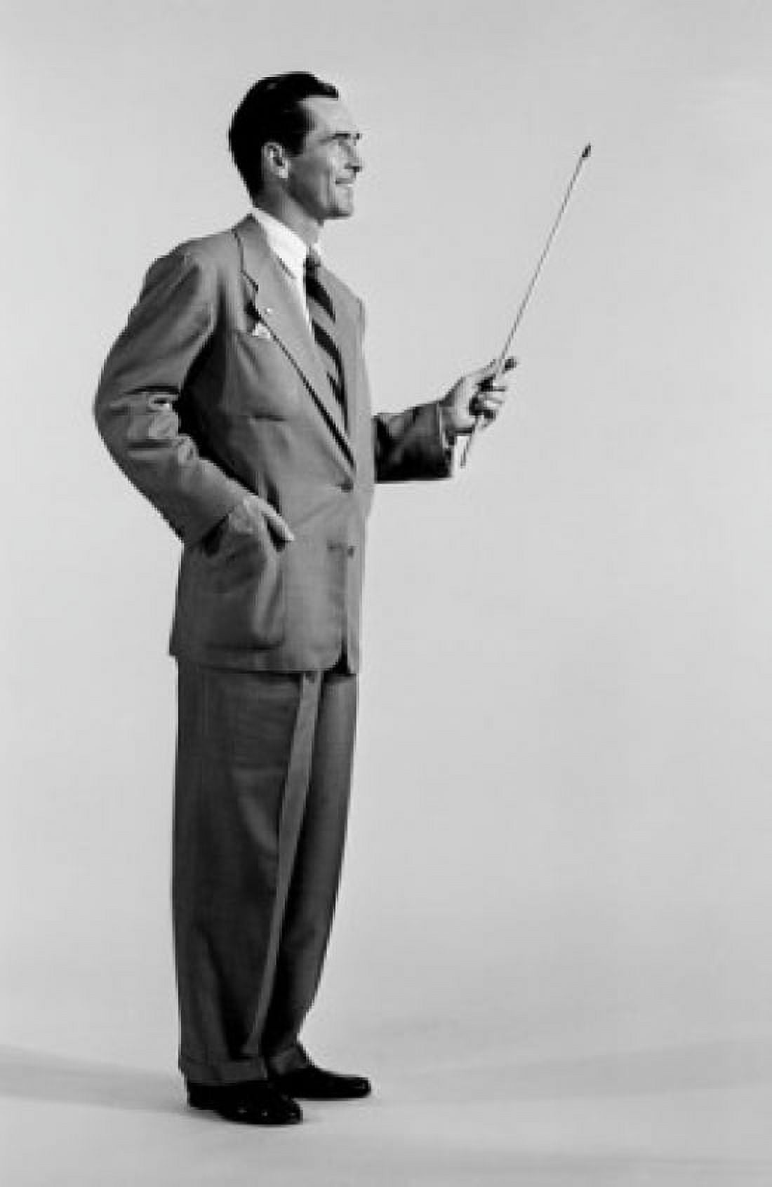 Studio shot of man holding baton Canvas Art - (24 x 36)