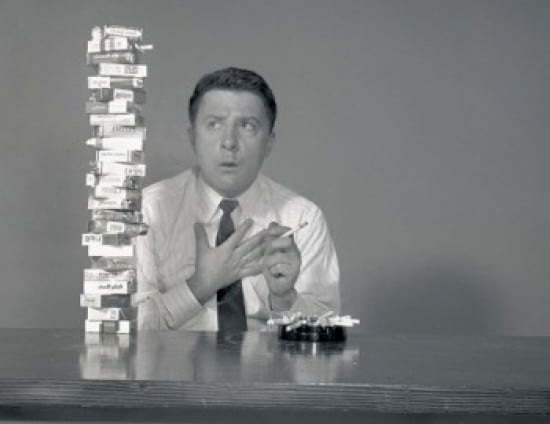 Studio shot of man looking at cigarettes Canvas Art - (18 x 24)