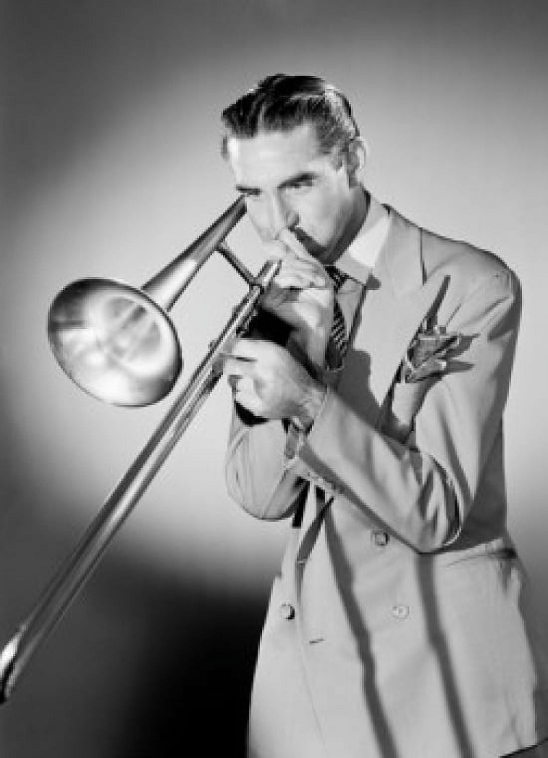 Studio shot of man playing trombone Canvas Art - (18 x 24)