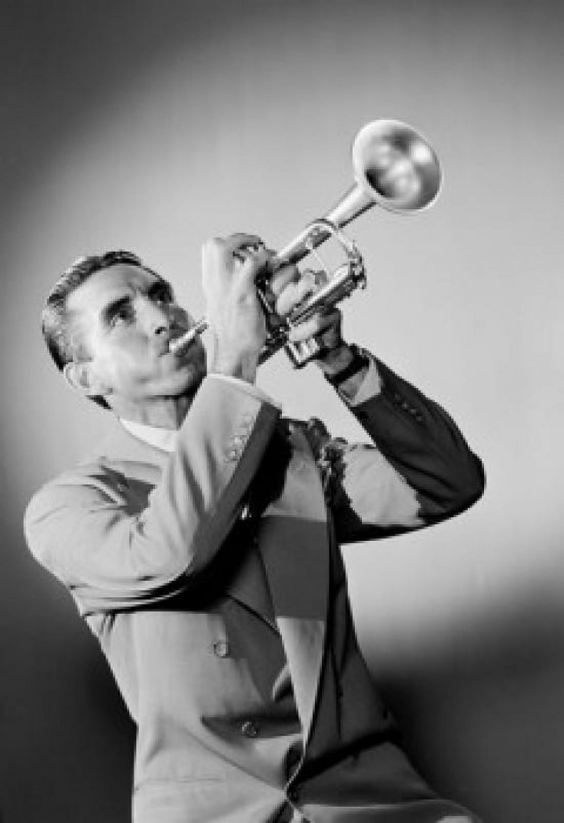 Studio shot of man playing trumpet Canvas Art - (18 x 24)