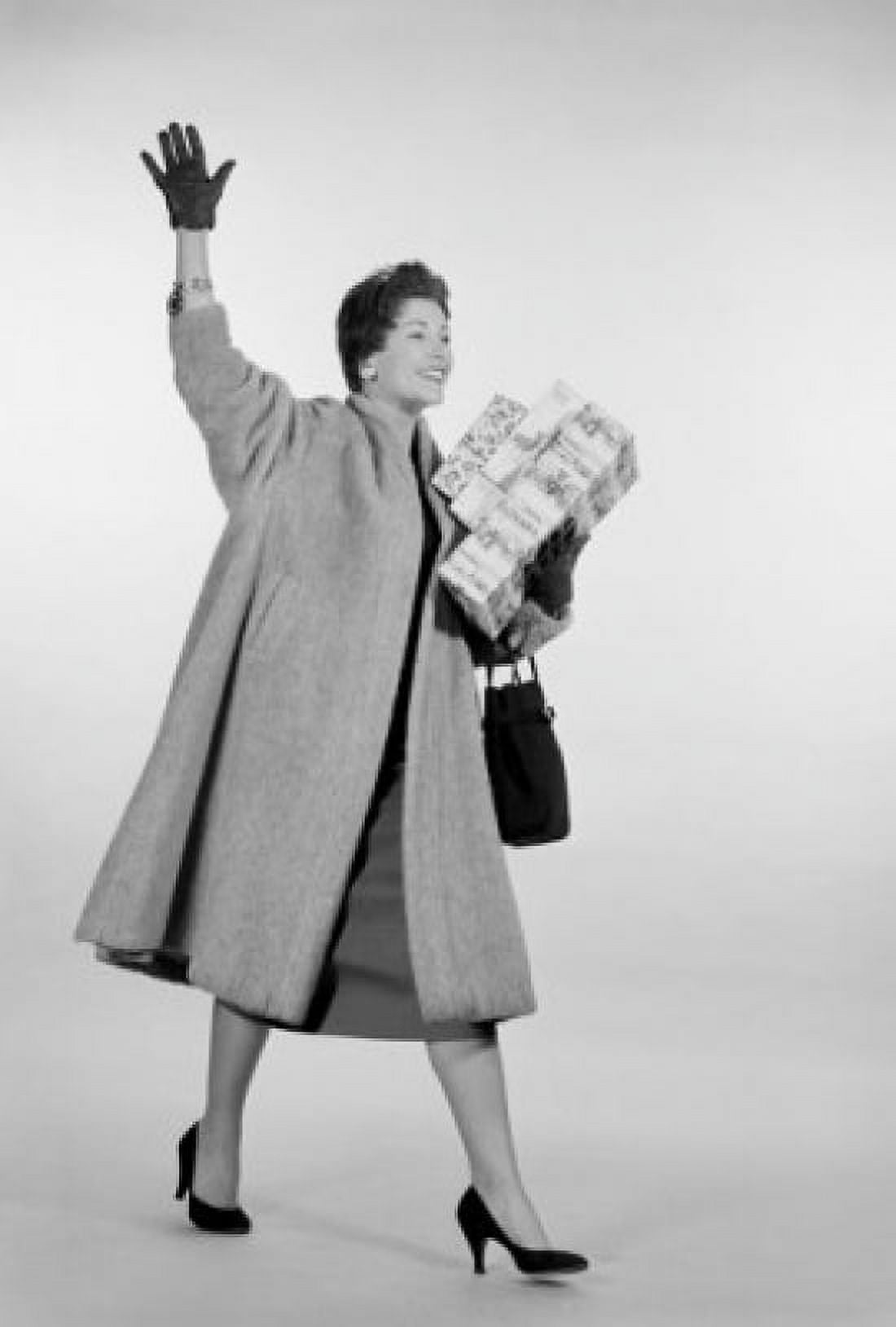 Studio shot of mid adult woman with shopping Canvas Art - (24 x 36)