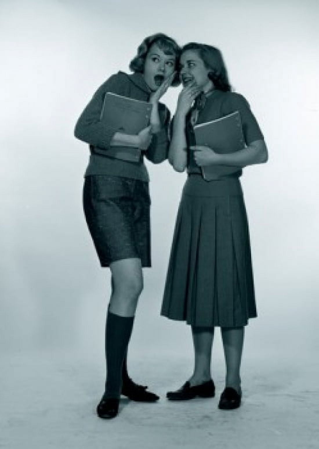 Studio shot of two female students gossiping Canvas Art - (18 x 24)