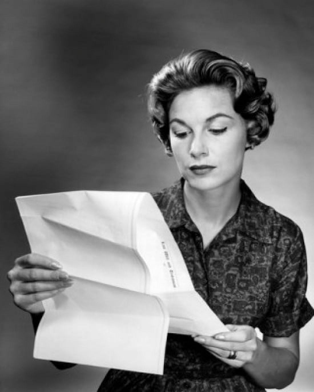 Studio shot of woman reading plan Canvas Art - (24 x 36)