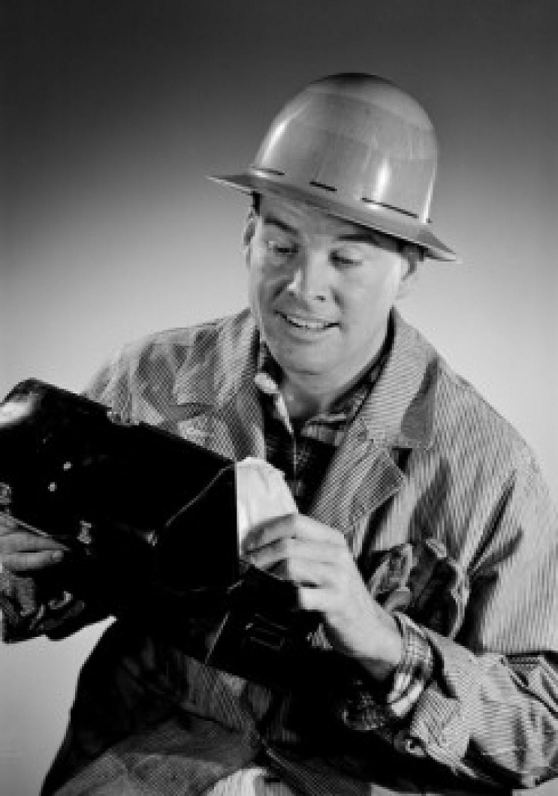 Studio shot of worker opening lunchbox Canvas Art - (24 x 36)