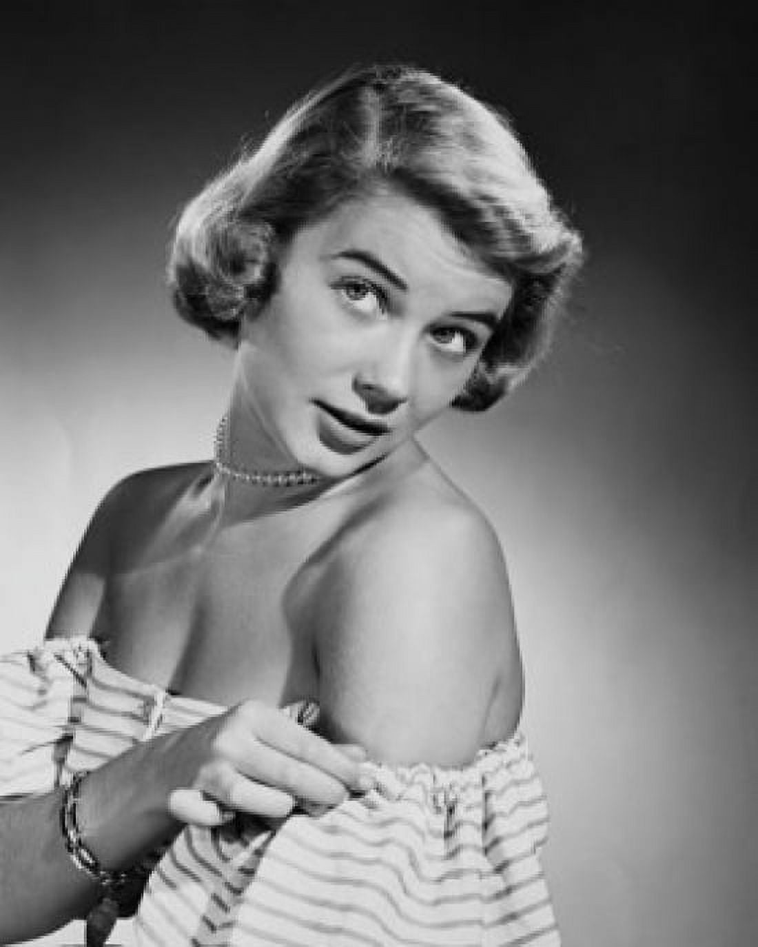 Studio shot of young woman adjusting dress Canvas Art - (24 x 36)