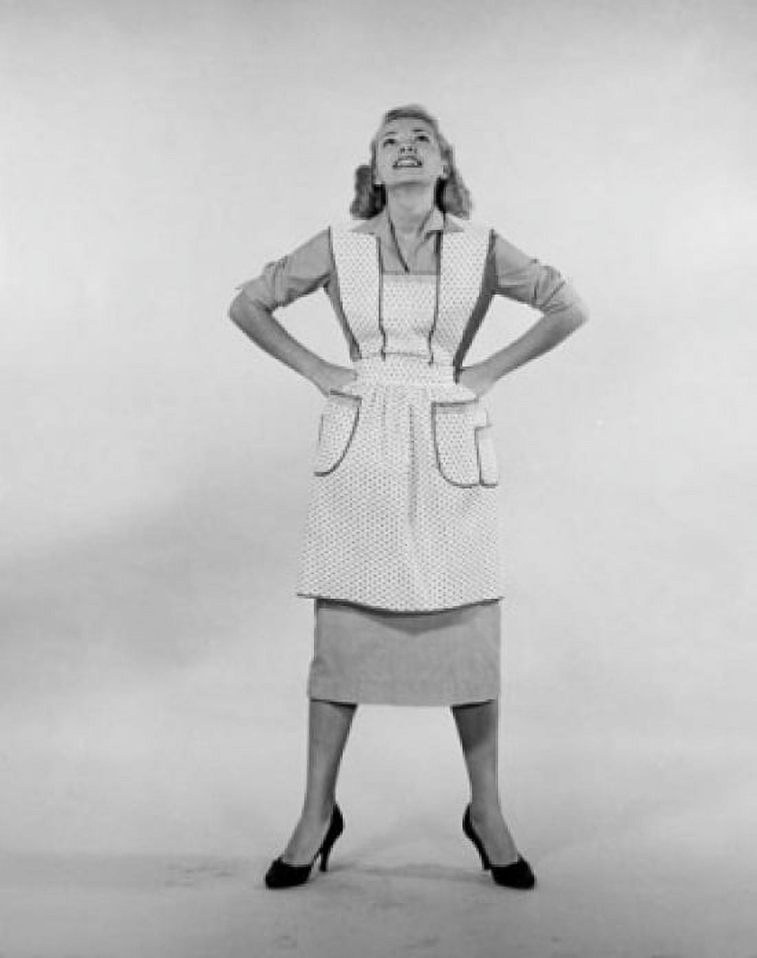 Studio shot of young woman standing with arms akimbo Canvas Art - (24 x 36)