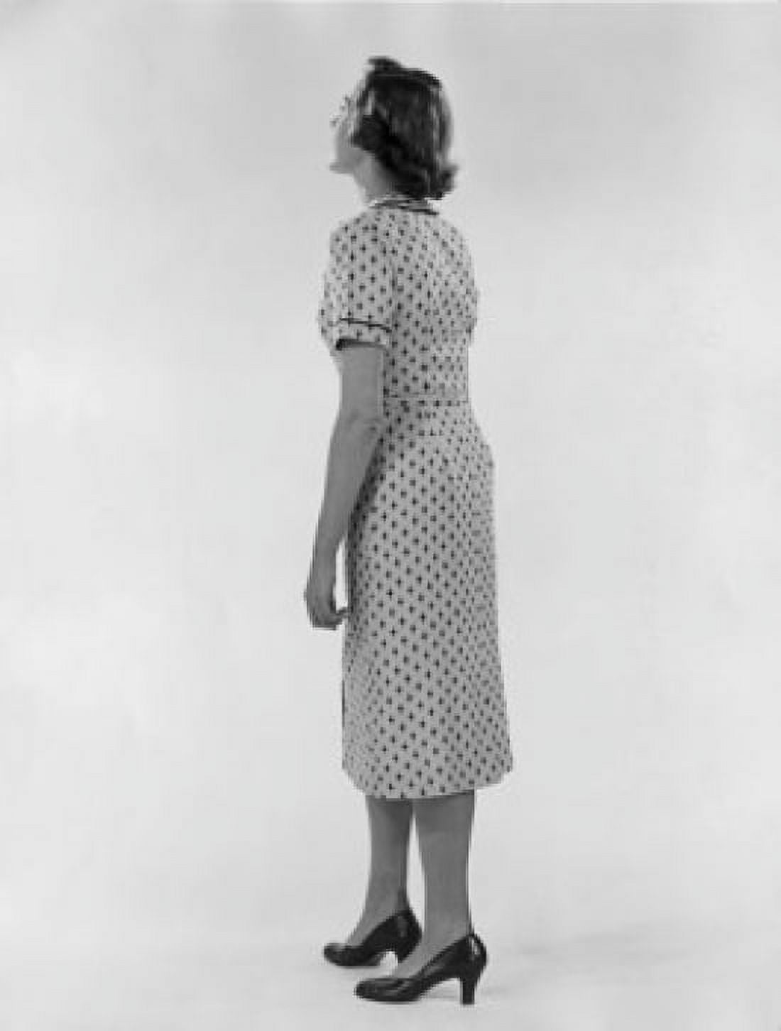 Studio shot of young woman wearing spotted dress Canvas Art - (18 x 24)