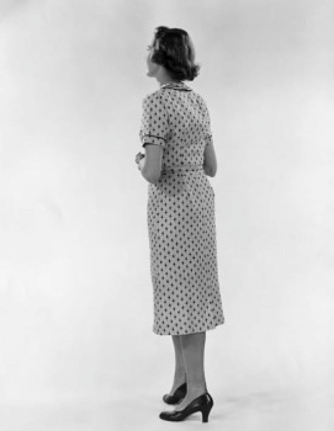 Studio shot of young woman wearing spotted dress Canvas Art - (18 x 24)