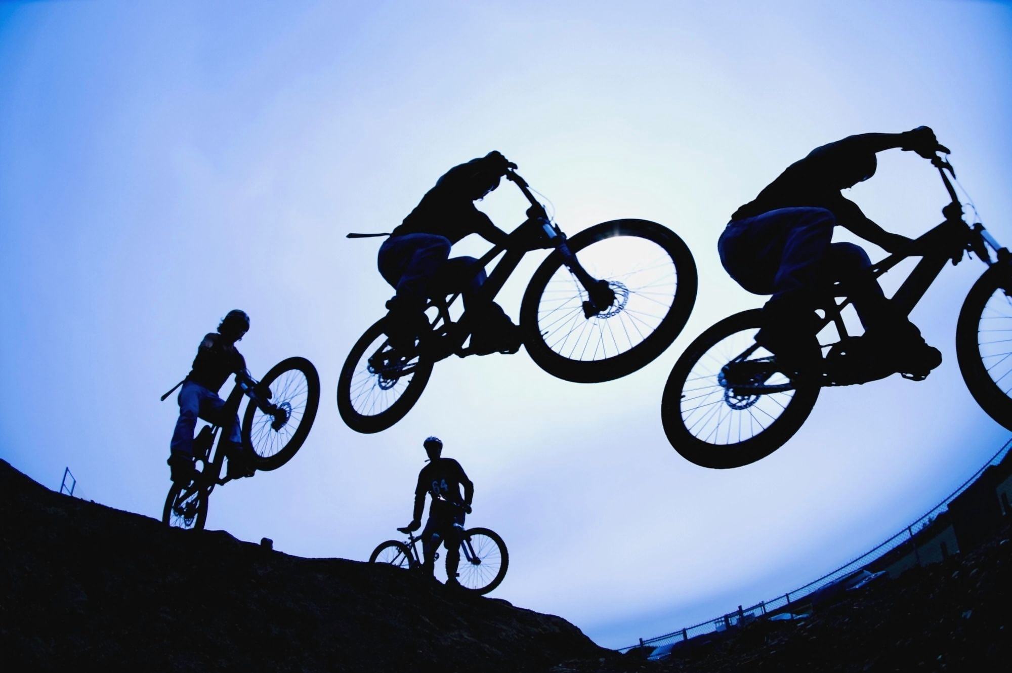 Stunt Cyclists Alberta Canada Canvas Art - Corey Hochachka Design Pics (34 x 22)