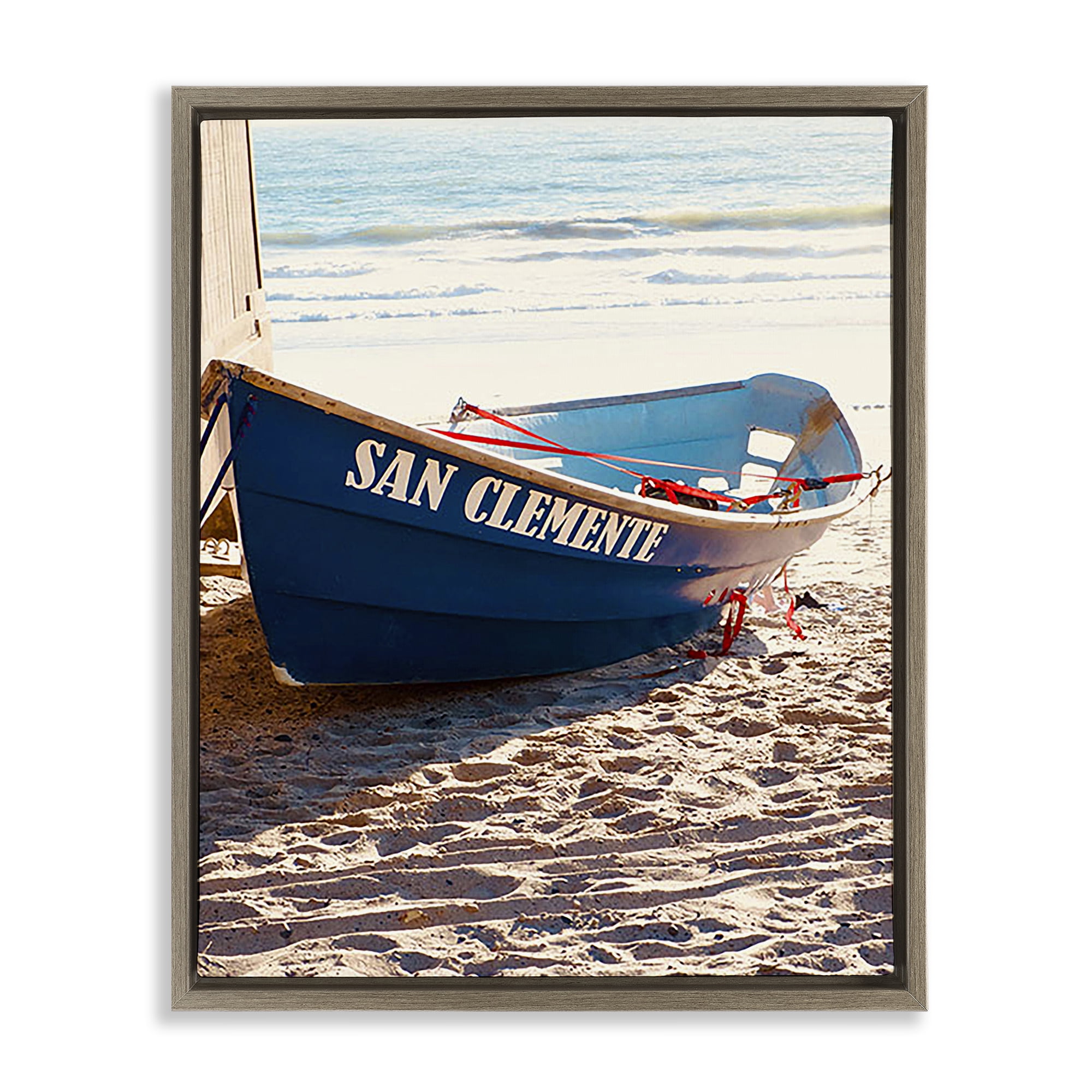 Stupell Industries Blue Boat on Sand Transportation Photography Brown Floater Framed Canvas Art Print Wall Art, 25 x 31