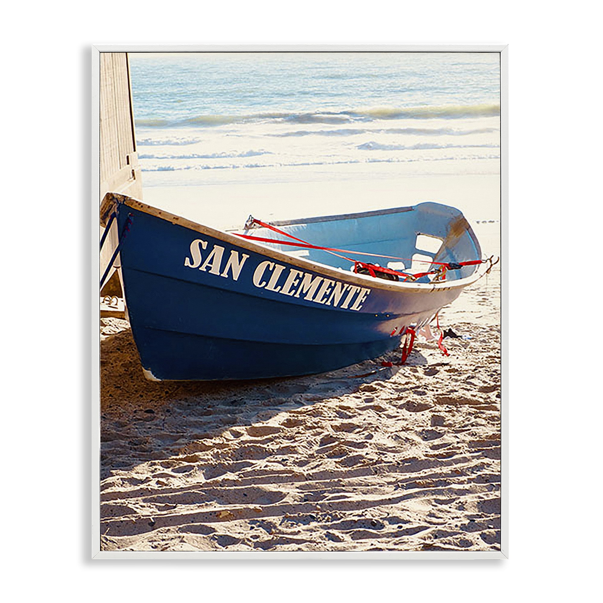 Stupell Industries Blue Boat on Sand Transportation Photography White Framed Art Print Wall Art, 24 x 30