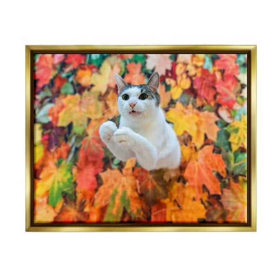 Stupell Industries Cat in Autumn Leaf Pile Animals & Insects Photography Gold Floater Framed Canvas Art Print Wall Art, 21 x 17