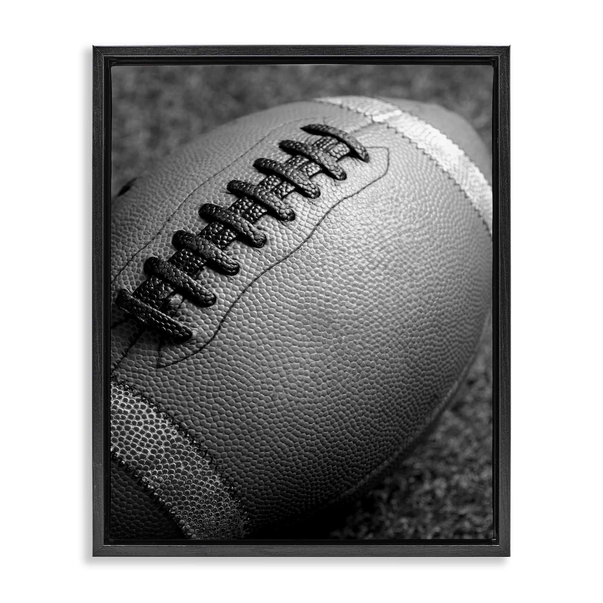 Stupell Industries Close Up Football Sports Photography Black Floater Framed Canvas Art Print Wall Art, 25 x 31