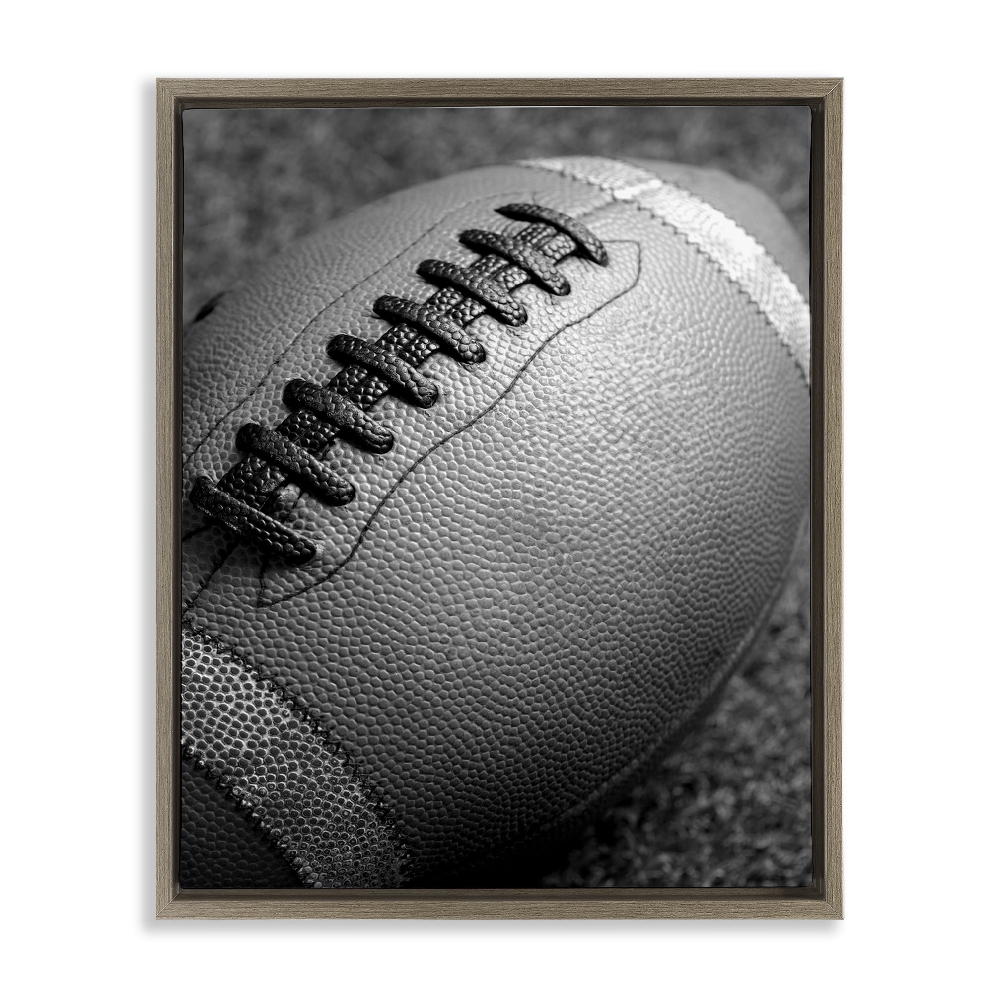 Stupell Industries Close Up Football Sports Photography Brown Floater Framed Canvas Art Print Wall Art, 25 x 31