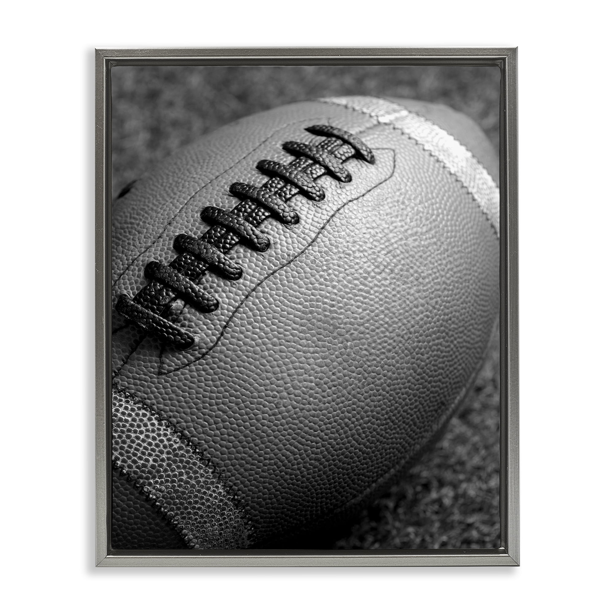 Stupell Industries Close Up Football Sports Photography Gray Floater Framed Canvas Art Print Wall Art, 25 x 31
