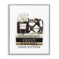 thumbnail image 1 of Stupell Industries Contemporary Elegant Glam Fashion Floral Bag on Bookstack Gray Framed Giclee Art, 16 x 20, by Ros Ruseva, 1 of 7