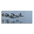 thumbnail image 1 of Stupell Industries Flying Geese Wings Flapping Calm Ocean Water Canvas Wall Art, 40 x 17, Design by Amy Brinkman, 1 of 5