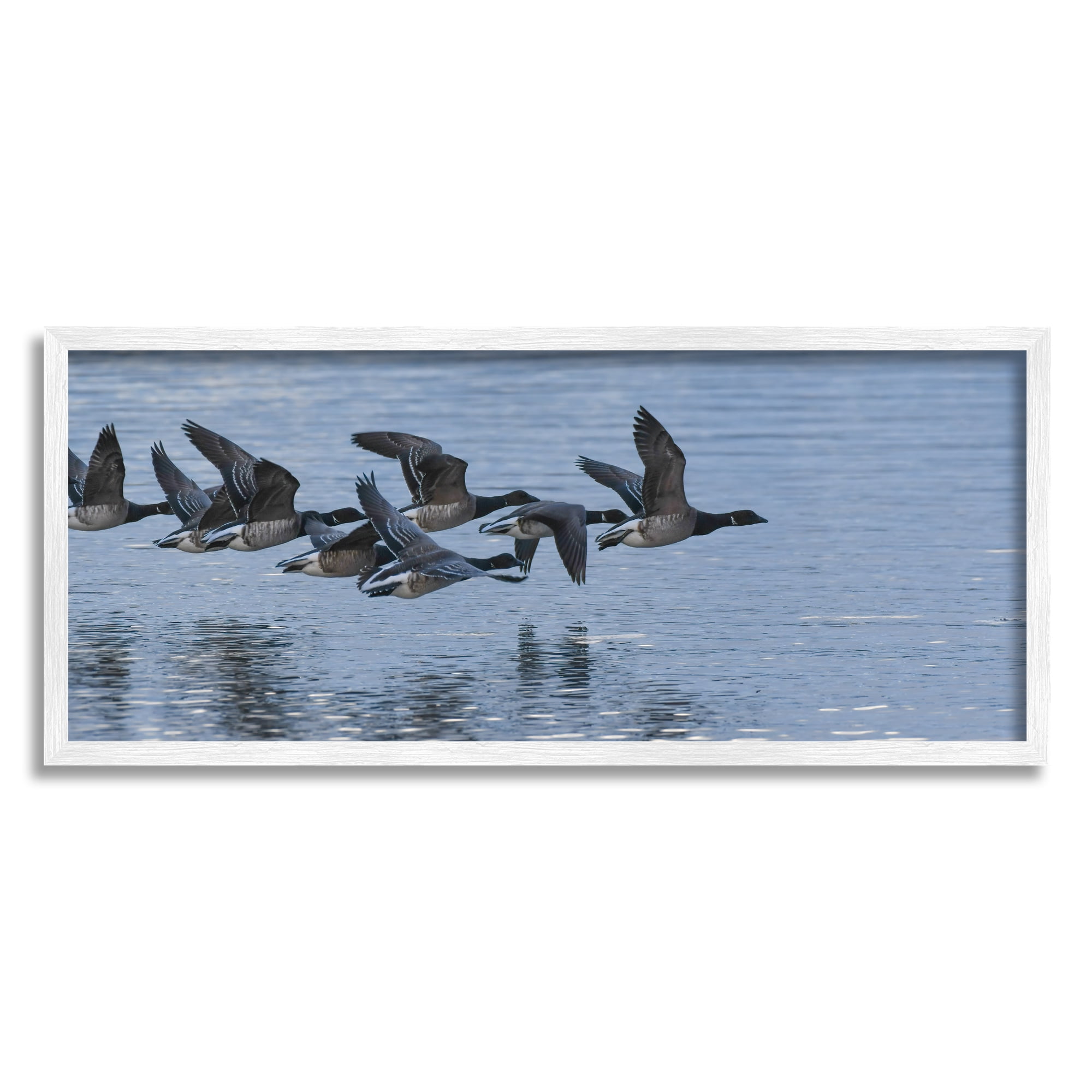 Flying Geese Over Calm Ocean White Wood Framed Wall Art