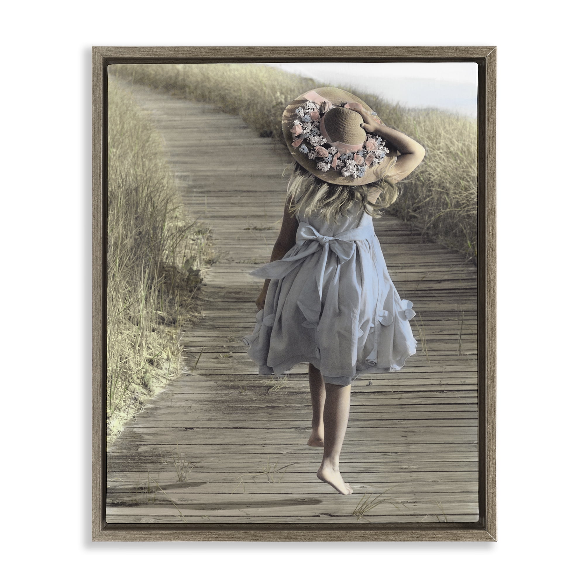 Stupell Industries Girl With Sun Hat Walking Brown Framed Floater Canvas Wall Art, design by Kendra Dew