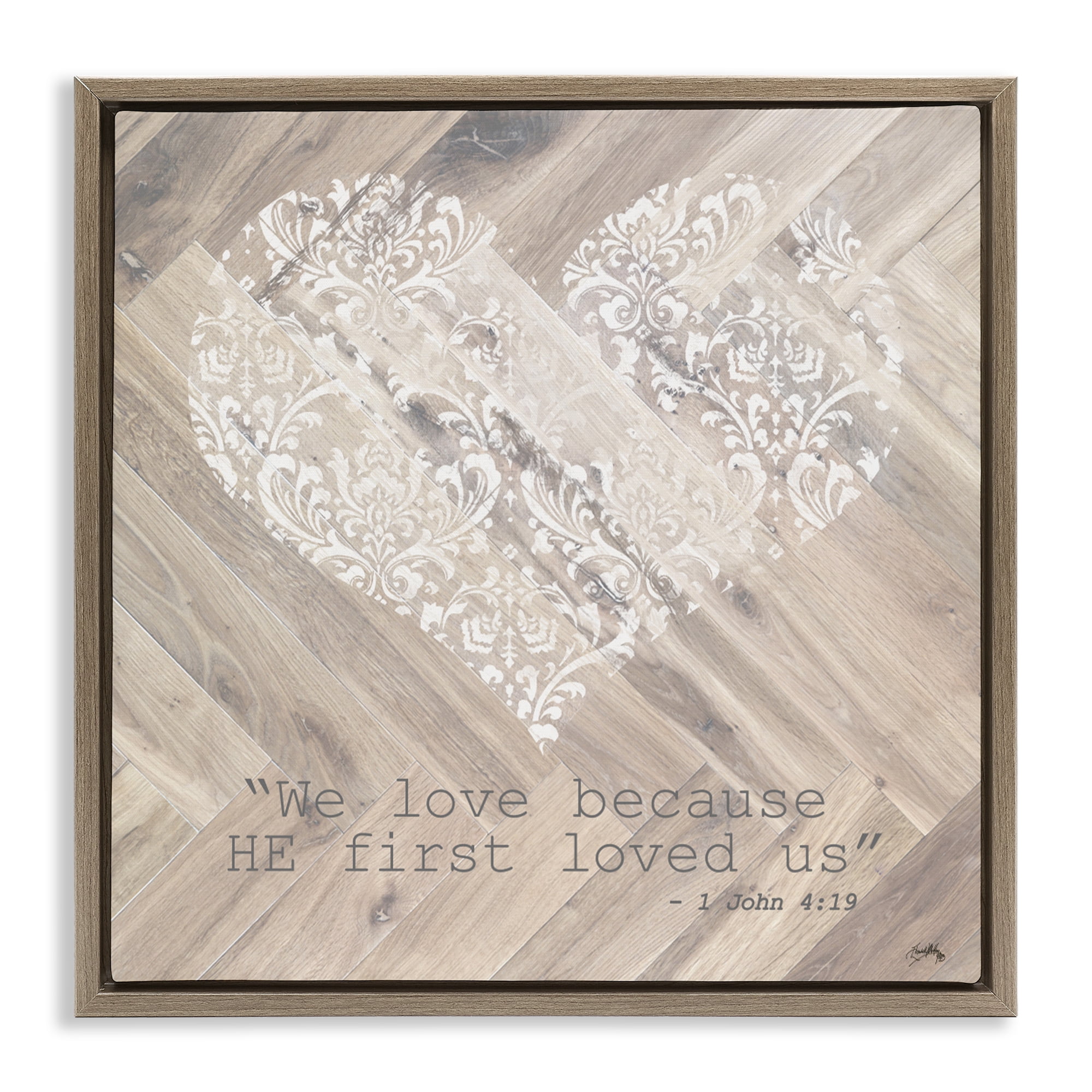 Stupell Industries He Loved Us First Brown Framed Floater Canvas Wall Art, design by Elizabeth Medley