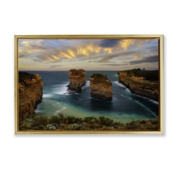 Stupell Industries Loch Ard Gorge Landscape Gold Framed Floater Canvas Wall Art design by Lincoln Harrison, 21 x 31