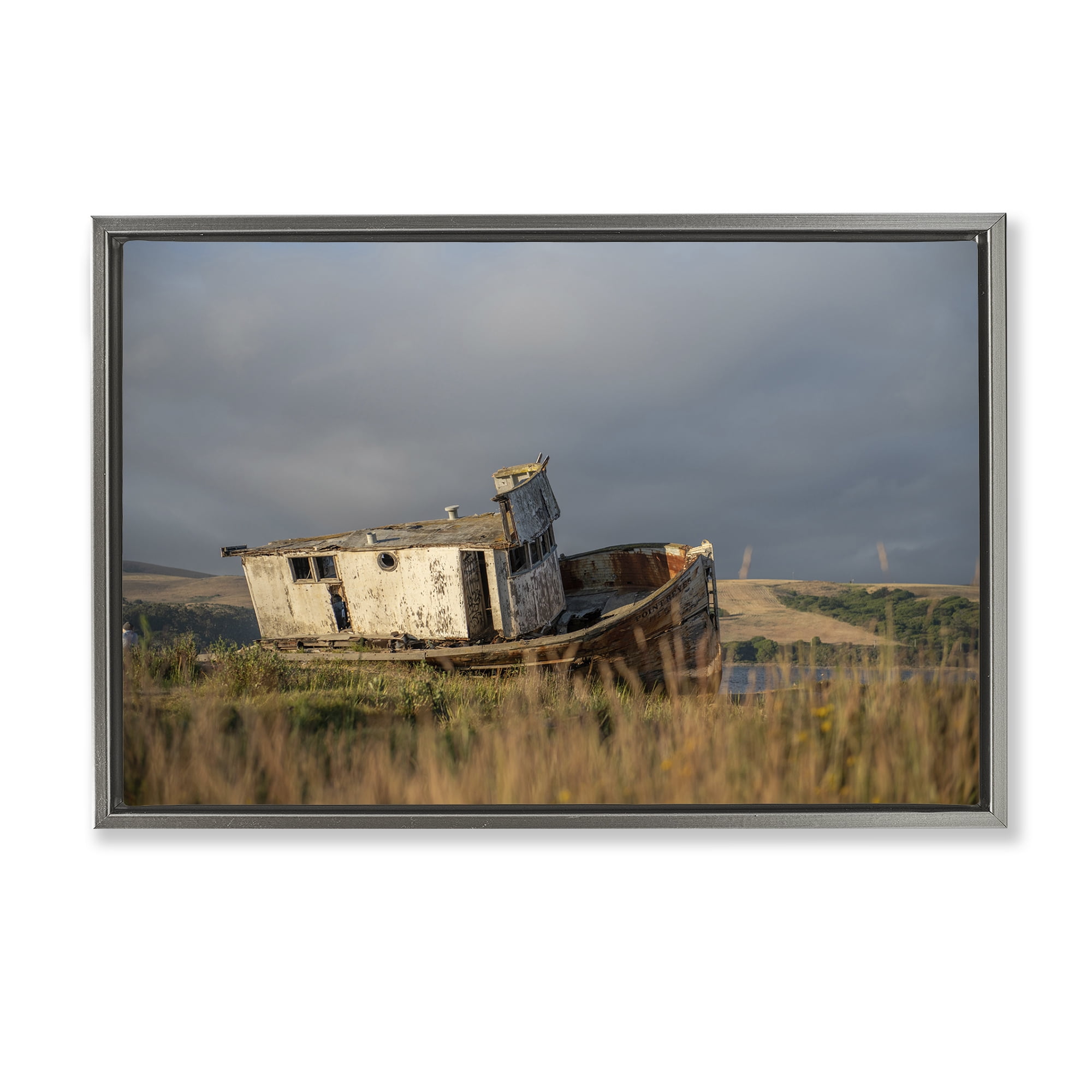 Stupell Industries Old Shipwreck on Beach Landscape & Nature Photography Gray Floater Framed Canvas Art Print Wall Art, 25 x 17